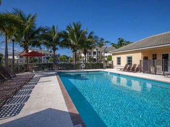 resort style pool and lounge chairs at Valencia Pointe, Miami, Florida